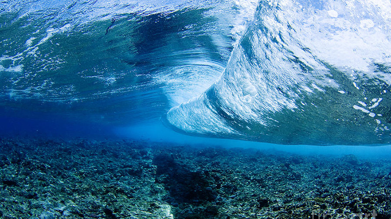 A wave breaking over a reef