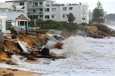 A house damaged by coastal erosion